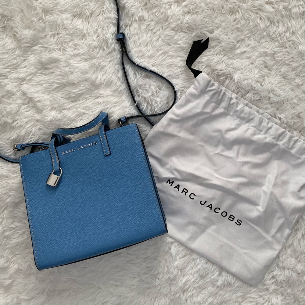 New with dust bag. I order it online so no box.